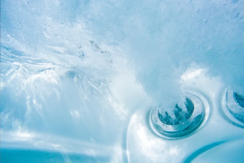 Spa repair in Lake Havasu City: JM Pool Service tech working on a hot tub equipment pack